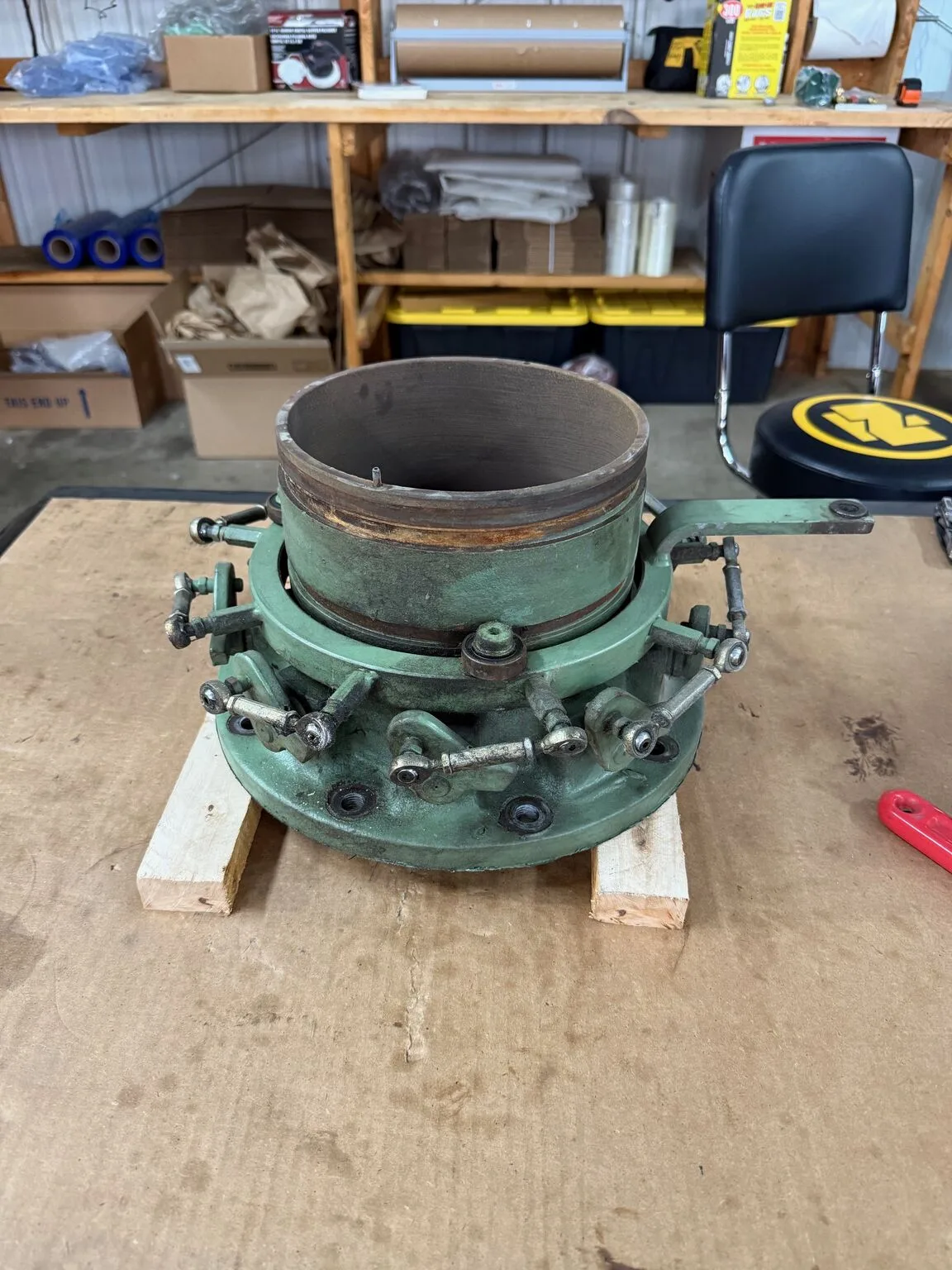 Inlet guide vane assembly as it arrived, with worn paint, worn bushings and broken linkages